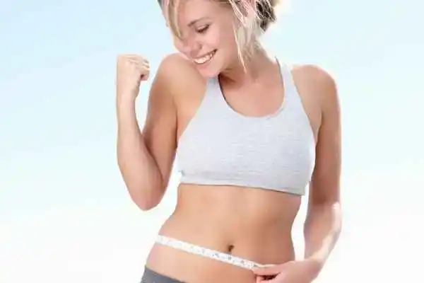 Unraveling the Mystery: Where Does the Body Fat Loss From First? 3 Image of woman happy with fat loss Wales