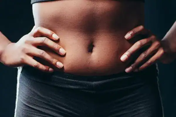 Toning Your Stomach: The Ultimate Guide to Achieving a Sculpted Stomach While Shedding Pounds 1 Image of a toned stomach after non surgical treatment Wales